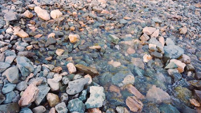 Spring water flows out of the ground