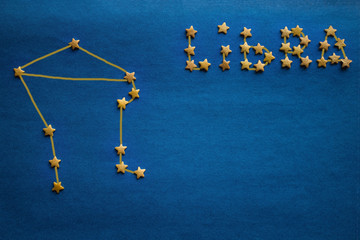 Libra, the zodiacal constellation.