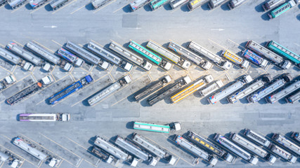 Aerial top view automotive fuel tankers shipping fuel, Tanker truck parking aerial view.