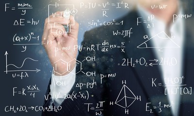 Businessman and  analytics symbols on  background