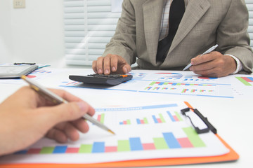 Businessmen hand are invstment project rsidence at work office.Concept Business..