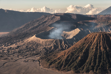 Mount volcano an active with smoke, Kawah Bromo, Gunung Batok at sunrise © Mumemories