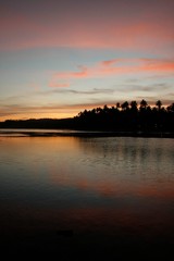 Obraz premium CALM WATERS ON SUNRISE AT NIAS INDONESIA, VERTICAL