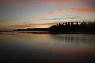 CALM WATERS ON SUNRISE AT NIAS INDONESIA