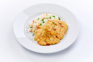 fried chicken breast with rice and vegetables on the white background