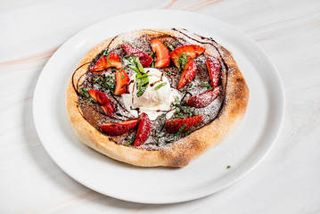 strawberry pizza with chocolate and ice cream