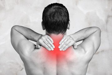 Strong man with neck pain, back view - obrazy, fototapety, plakaty