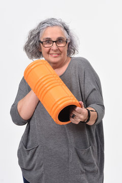 woman with roller foan on white