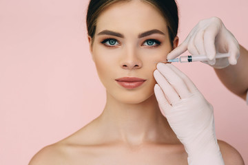 woman with perfect face having facial injections , biorevitalization and beauty injections - obrazy, fototapety, plakaty