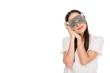 brunette young woman in cat sleeping eye mask isolated on white