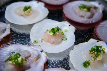 Shellfish, which is seafood on a white plate