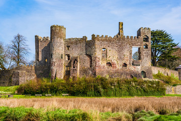 Fototapeta na wymiar Ruins of the medieval Laugharne castle in Laugharne, Pembrokeshire, Wales, UK