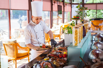 cooking seafood in a restaurant.