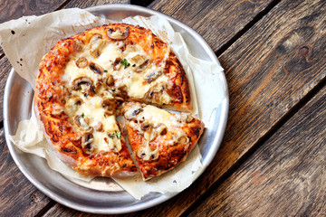 Homemade pizza with mushrooms