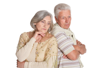 Sad senior couple isolated on white background