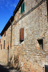 Stone wall of an old house, Italy