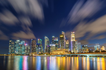 Singapore night city skyline at Marina Bay and Singapore business district