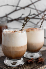 Cold iced coffee with vanilla ice cream and cinnamon