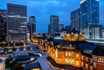 Tokyo Station at night,is a railway station in Chiyoda-ku, Tokyo, Japan. The original station is located in Chiyoda's Marunouchi business district .