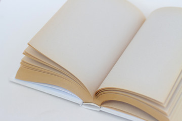 opened book with blank pages on white background
