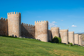 Fototapeta na wymiar Walls surrounding Spanish city of Avila, turrets
