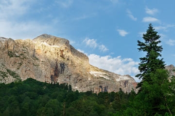 Gray high rocky mountain located. Caucasian reserve, mountain Fisht