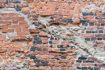 Old damaged worn brick wall background