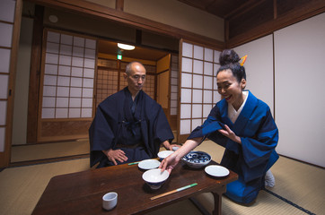 Senior japanese couple moments in a traditional house