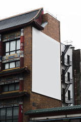 Big billboard template on building in city
