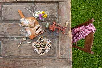 Poppy seed strudel. Homemade cake. Rustic wooden backgroud. Top view. Picnic in nature.