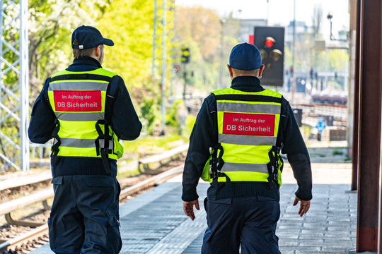 Back turned DB Sicherheit officers, security service of the German company Deutsche Bahn