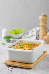 Cheese broccoli cabbage casserole, oven baked. Selective focus, space for text.