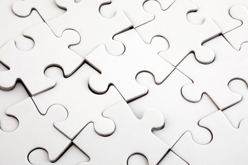 Top view of white jigsaw puzzle