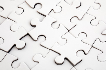 Top view of white jigsaw puzzle