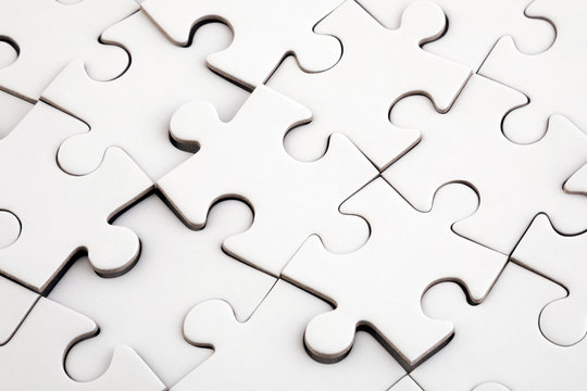 Top view of white jigsaw puzzle