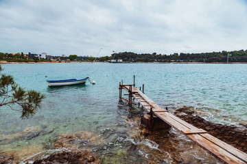 view of small fishing pier with boat near it