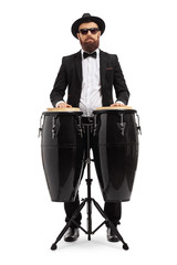 Male musician playing on conga drums