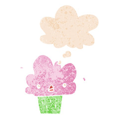cartoon cupcake and thought bubble in retro textured style