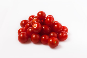 mountain of small red cherry tomatoes