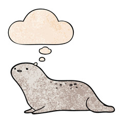 cartoon seal and thought bubble in grunge texture pattern style