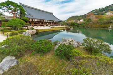 Fototapeta premium Garden with pond in front of Tenryu-ji Temple at Arashiyama, Kyoto, Japan