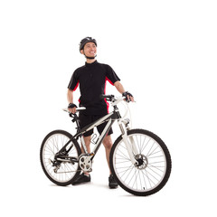 Obraz na płótnie Canvas A male bicyclist posing with his bicycle, full length studio portrait isolated on white background