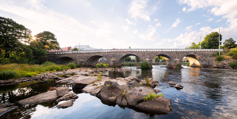 Tullbron, or tullbridge, old stone bridge in central falkenberg over the river Atran