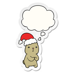 cartoon christmas bear worrying and thought bubble as a printed sticker
