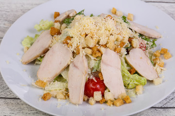 Caesar salad with chicken breast