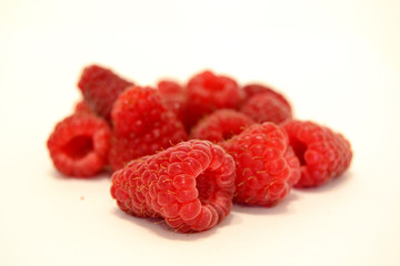 frozen raspberries ifrozen raspberries isolated on a white background on the table
