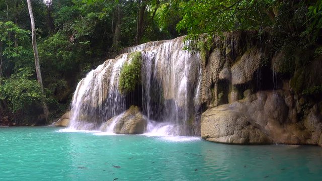Beautiful waterfall and emerald pool in tropical rain forest in Thailand.