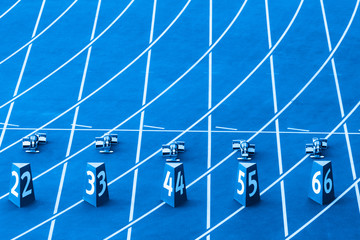 Starting blocks in track and field. Blue color filter