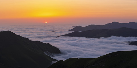 Fototapeta premium sunrise with sea of clouds in the Pyrenees mountain range