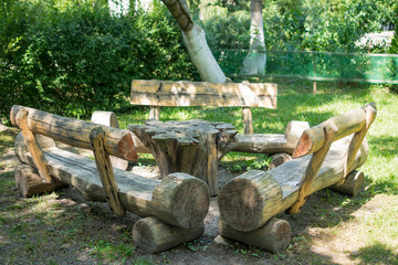 dining table and chairs on the grass
